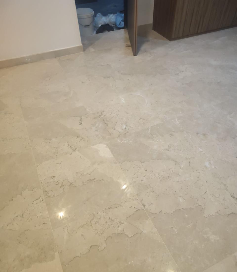 Close-up of beige marble floor tiles and veining