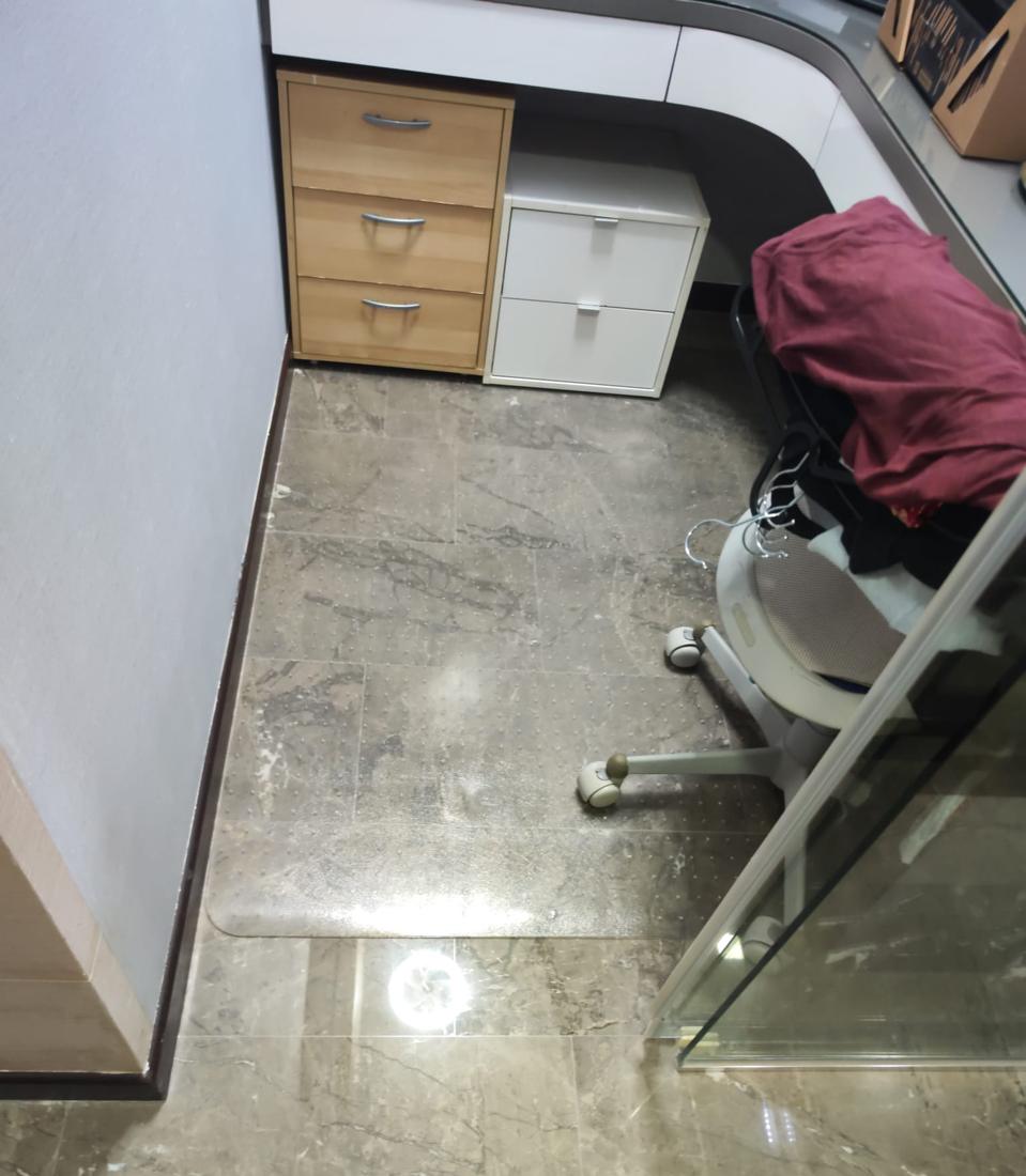 Polished grey marble floor in a study room